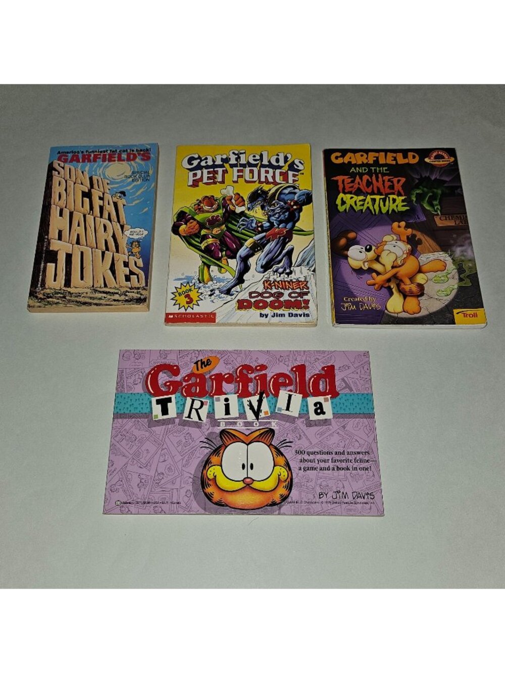4 Garfield Paperback Books Lot Jokes Trivia Chapter Pet Force Teacher Creature